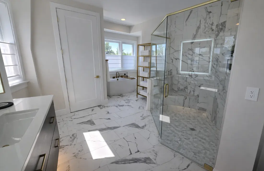 Custom Italian marble bathroom tile installation with frameless shower by 2020 Flooring