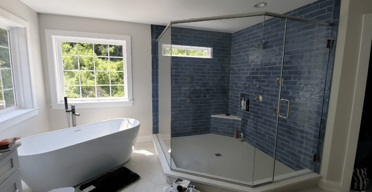 Finished bathroom tile installation with natural light by 2020 Flooring