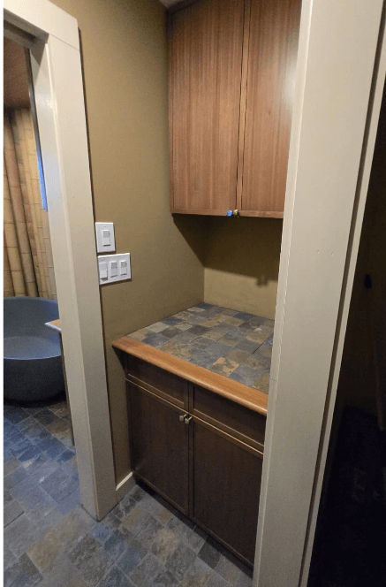 Custom wood vanity with stone countertop in Fulton MD bathroom